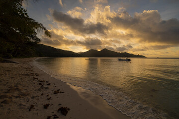 Sunrise view of Baie Lazare beach on Mahe Island in the Seychelles