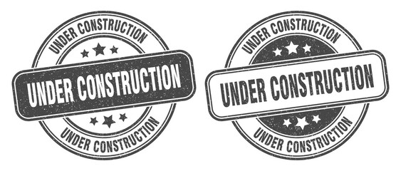 under construction stamp. under construction label. round grunge sign