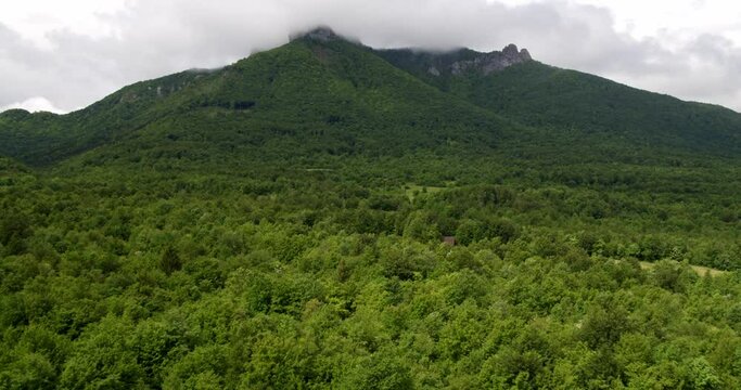 Aerial view of the evaporation after rain and low rain clouds over Klek mountain, Croatia