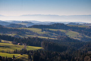 Fototapeta na wymiar view from Oberbütschel over the hills of Schwarzenburgerland