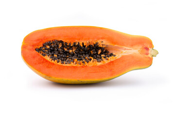 Half ripe papaya fruit with seeds isolated on white background. full depth of field