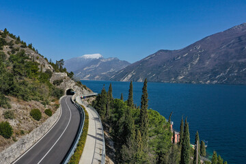 Limone sul Garda - bicycle path hanging on Garda Lake view by Drone.
Cycling on Garda on Holiday,...