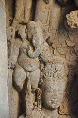 Carved idol of stone inside Cave 1, Elephanta Caves, Gharapuri island, Mumbai, Maharashtra, India