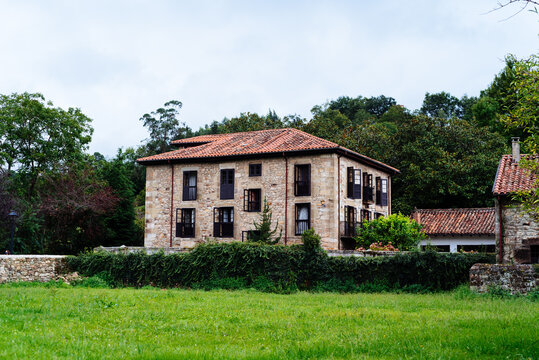 Old rural house surrounded by trees in Spain