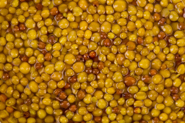 Yellow mustard texture as background.