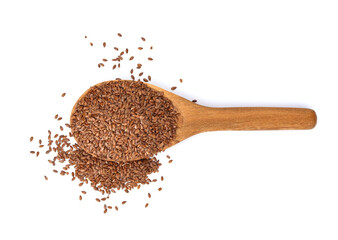 Flax seed or linseed in wood spoon isolated on white background