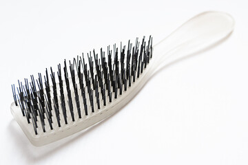 white comb with black teeth