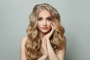 Naklejka premium Cute young woman with long healthy perfect hair on white background