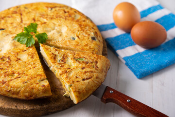 Traditional Spanish omelette with potatoes and zuuchini