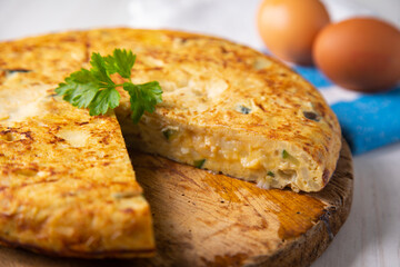 Traditional Spanish omelette with potatoes and zuuchini