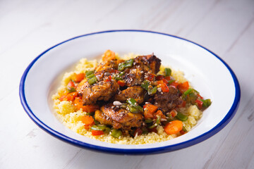 Marinated chicken with vegetables and cuscus