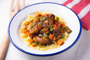 Marinated chicken with vegetables and cuscus