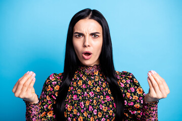 Photo of offended displeased lady show fingers open mouth wear floral print shirt isolated blue...