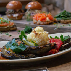 Roasted vegetables, salad and sliders