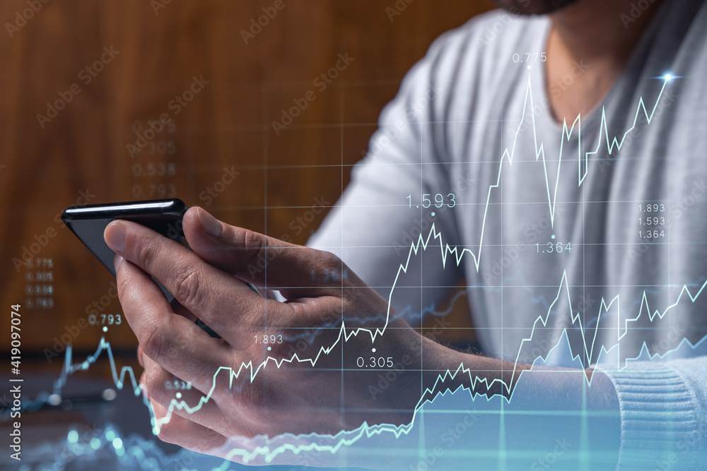 Poster trader holding in the hands a smart phone and researching stock market to proceed right investment s