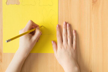 Easter bunny step by step instructions. Step 1 Draw a bunny shape.