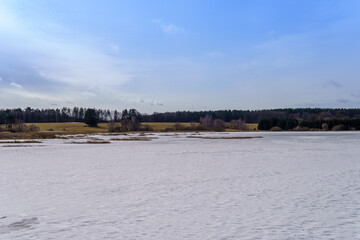 Naklejka premium winter view over a frozen lake