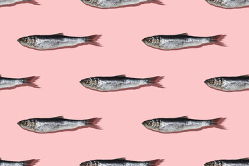 Pattern of Baltic Herring on a Pink color texture background.