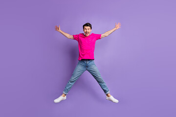 Full body portrait of cheerful impressed guy raise hands make star figure open mouth isolated on purple color background