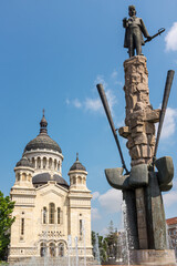 Fototapeta na wymiar Assumption Cathedral and Statue of Avram Iancu