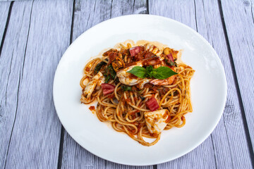Spicy Seafood Spaghetti is a food that is decorated within plate beautifully and It is a popular food.