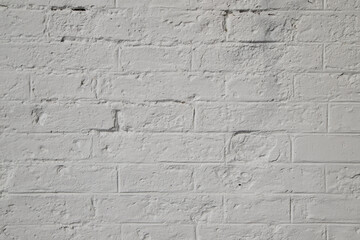 white brick wall, abstract background texture with old and vintage style pattern. Home or office design backdrop.
