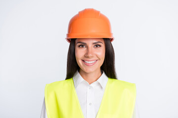 Photo of lovely positive worker lady toothy beaming smile wear helmet shirt vest isolated white color background