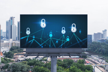 Padlock icon hologram on road billboard over panorama city view of Kuala Lumpur at day time to...