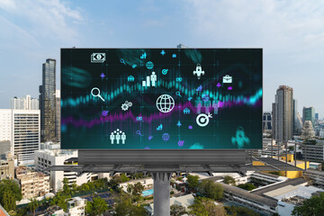 Research and development hologram on billboard over panorama city view of Bangkok. The hub of new...