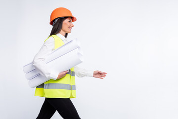 Profile photo of lady hold rolls paper walk look empty space wear helmet shirt vest isolated white color background