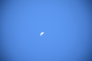 Moon taking a peek to see if it is the right time to come out.