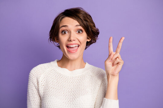 Photo of charming lady hand fingers show v-sign symbol open mouth isolate don magenta color background