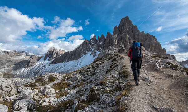 A man hiking at Tre Cime di Lavaredo, Italy