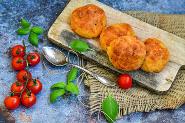 Home made gluten free muffins  with bio eggs ,parmesan cheese ,mushroom and  herbs on wooden background