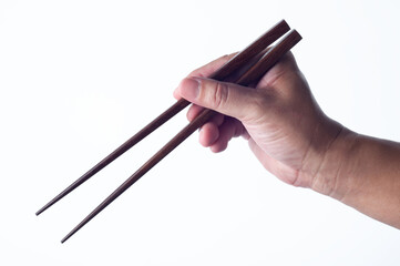 hand hold wooden chopsticks on white background with clipping path