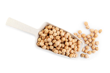 Scoop with chickpeas on white background, top view. Natural food