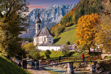 Amazing nature landscape. Impressive Autumn Scenic landscape in the Bavarian Alps. famous Parish...