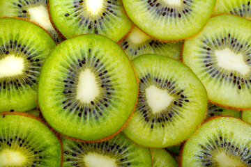 Slices of fresh and green kiwi fruits