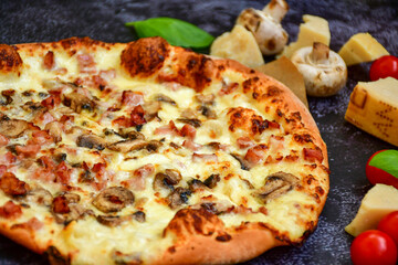 Tasty hot italian carbonara pizza with ham, bechamel sauce,mushroom,tomatoes  and cheese. Pizzeria menu. Concept poster for Restaurants or pizzerias. Top view