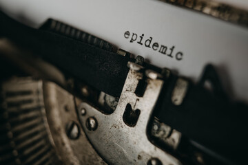 Typing "epidemic" on retro typewriter