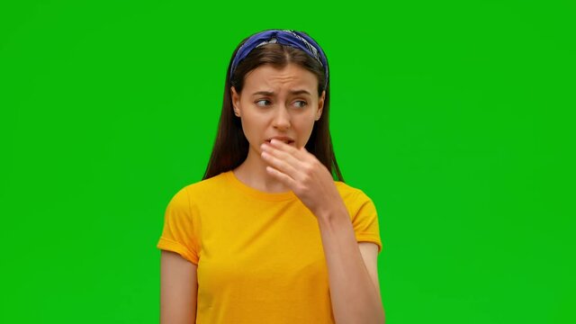 Young dissatisfied girl waves hand near nose, feels unpleasant smell, squints because of stench something disgusting. Alpha channel