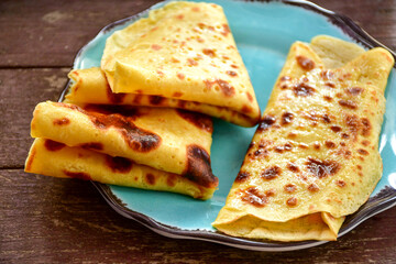 Pancakes with cheese and butter . Home made pancakes  with organic bio eggs