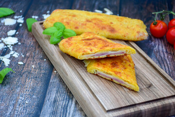 Home made Hot pockets with ham and cheese. Ketogenic  gluten free Turnover filled  with edam and prosciutto.