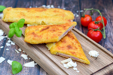 Home made Hot pockets with ham and cheese. Ketogenic  gluten free Turnover filled  with edam and prosciutto.