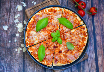  Home made italian pizza with mushrooms,ham and cheese. Italian food
