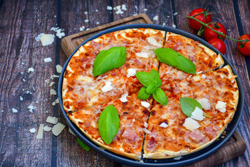  Home made italian pizza with mushrooms,ham and cheese. Italian food