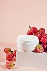 Organic cosmetics with grape seed oil. Zero Waste Winemaking. Skincare cosmetic product and grapes...