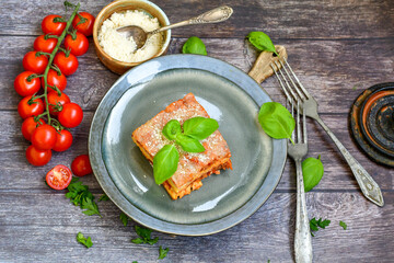 Home made italian lasagna pasta  bolgonese with tomato sauce and basil