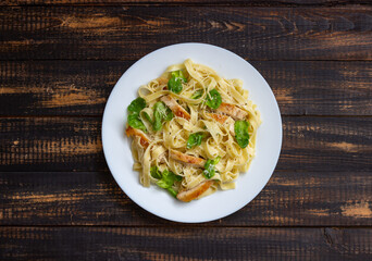 Italian fetuccini alfredo pasta with chicken. National cuisine. Healthy eating.