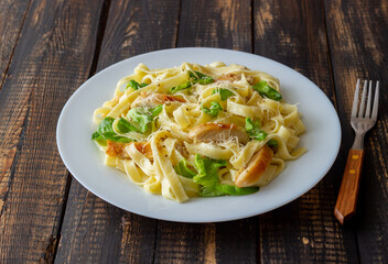 Italian fetuccini alfredo pasta with chicken. National cuisine. Healthy eating.